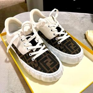I wore these sneakers one time but they were too big. I purchased them from Saks